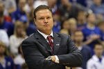SAN ANTONIO, TX - MARCH 27:  Head coach Bill Self of the Kansas Jayhawks reacts during the southwest regional final of the 2011 NCAA men's basketball tournament against the Virginia Commonwealth Rams at the Alamodome on March 27, 2011 in San Antonio, Texas. Virginia Commonwealth defeated Kansas 71-61.  (Photo by Ronald Martinez/Getty Images)