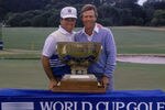 American golfers Ben Crenshaw (right) and Mark McCumber with their trophy after winning the WGC-World Cup golf tournament, Melbourne, 1988. (Photo by David Cannon/Getty Images)