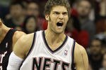 NEWARK, NJ - APRIL 03:  Brook Lopez #11 of the New Jersey Nets reacts against the Miami Heat at the Prudential Center on April 3, 2011 in Newark, New Jersey.The Heat defeated the Nets 108-94.NOTE TO USER: User expressly acknowledges and agrees that, by downloading and/or using this Photograph, user is consenting to the terms and conditions of the Getty Images License Agreement.  (Photo by Jim McIsaac/Getty Images)