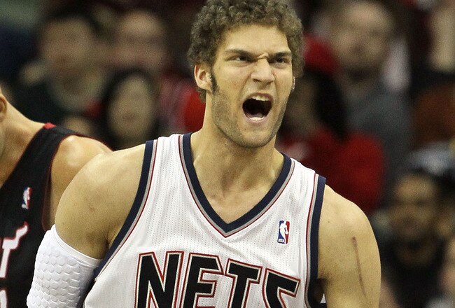 NEWARK, NJ - APRIL 03:  Brook Lopez #11 of the New Jersey Nets reacts against the Miami Heat at the Prudential Center on April 3, 2011 in Newark, New Jersey.The Heat defeated the Nets 108-94.NOTE TO USER: User expressly acknowledges and agrees that, by downloading and/or using this Photograph, user is consenting to the terms and conditions of the Getty Images License Agreement.  (Photo by Jim McIsaac/Getty Images)
