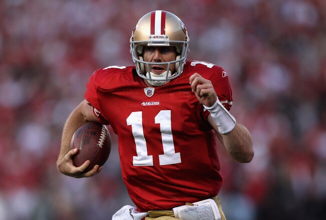 SAN FRANCISCO, CA - JANUARY 14:  Alex Smith #11 of the San Francisco 49ers runs in for a touchdown in the fourth quarter against the New Orleans Saints during the NFC Divisional playoff game at Candlestick Park on January 14, 2012 in San Francisco, California.  (Photo by Jed Jacobsohn/Getty Images)