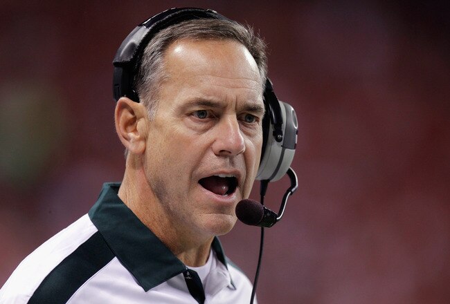 INDIANAPOLIS, IN - DECEMBER 03:  Head coach Mark Dantonio of the Michigan State Spartans coaches against the Wisconsin Badgers during the Big 10 Conference Championship Game at Lucas Oil Stadium on December 3, 2011 in Indianapolis, Indiana.  (Photo by Gregory Shamus/Getty Images)