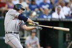 KANSAS CITY, MO - AUGUST 05: Brennan Boesch #26 of the Detroit Tigers drives the ball into right for a RBI triple in the first inning during a game against the Kansas City Royals at Kauffman Stadium on August 5, 2011 in Kansas City, Missouri.  (Photo by Ed Zurga/Getty Images)