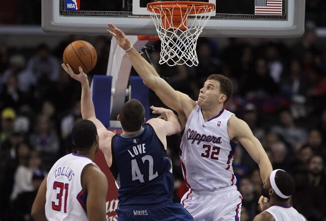 LOS ANGELES, CA - DECEMBER 20:  Blake Griffin #32 of the Los Angeles Clippers defends against Kevin Love #42 of the Minnesota Timberwolves during the second half at Staples Center on December 20, 2010 in Los Angeles, California. The Clippers defeated the Timberwolves 113-90. NOTE TO USER: User expressly acknowledges and agrees that, by downloading and or using this photograph, User is consenting to the terms and conditions of the Getty Images License Agreement.  (Photo by Jeff Gross/Getty Images)