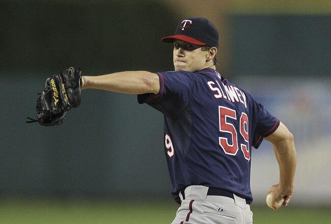 DETROIT - SEPTEMBER 09: Kevin Slowey #59 of the Minnesota Twins warms up prior to the start of the game gainst the Detroit Tigers at Comerica Park on September 9, 2011 in Detroit, Michigan.  (Photo by Leon Halip/Getty Images)