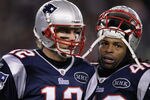 FOXBORO, MA - JANUARY 14:  (L-R) Tom Brady #12 and BenJarvus Green-Ellis #42 of the New England Patriots look on against the Denver Broncos during their AFC Divisional Playoff Game at Gillette Stadium on January 14, 2012 in Foxboro, Massachusetts.  (Photo by Elsa/Getty Images)