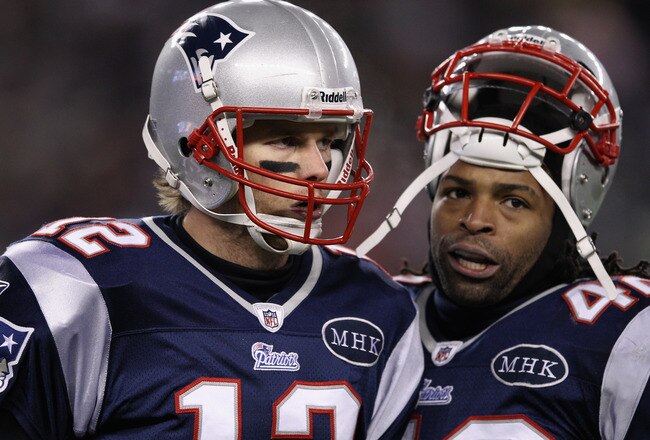 FOXBORO, MA - JANUARY 14:  (L-R) Tom Brady #12 and BenJarvus Green-Ellis #42 of the New England Patriots look on against the Denver Broncos during their AFC Divisional Playoff Game at Gillette Stadium on January 14, 2012 in Foxboro, Massachusetts.  (Photo by Elsa/Getty Images)