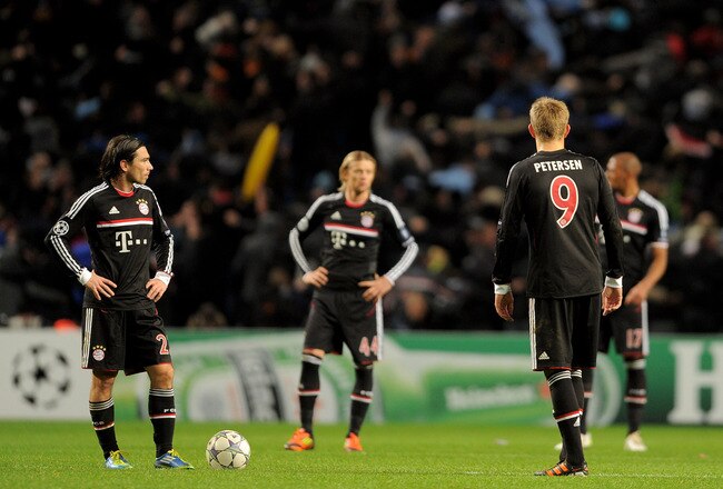 MANCHESTER, ENGLAND - DECEMBER 07:  The Bayern Muenchen players look on after conceding a goal during the UEFA Champions League Group A match between Manchester City and FC Bayern Muenchen at the Etihad Stadium on December 7, 2011 in Manchester, England. (Photo by Michael Regan/Getty Images)