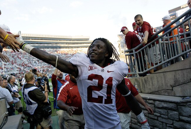 STATE COLLEGE, PA - SEPTEMBER 10:  Dre Kirkpatrick #21 of the Alabama Crimson Tide celebrates with fans after the Crimson Tide's win over Penn State Nittany Lions at Beaver Stadium on September 10, 2011 in State College, Pennsylvania.  (Photo by Rob Carr/Getty Images)