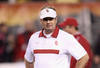 TEMPE, AZ - DECEMBER 30:  Head coach Bob Stoops of the Oklahoma Sooners walks amoung his team during warm ups the Insight Bowl against the Iowa Hawkeyes at Sun Devil Stadium on December 30, 2011 in Tempe, Arizona.  The Sooners defeated the Hawkeyes 31-14.  (Photo by Christian Petersen/Getty Images)