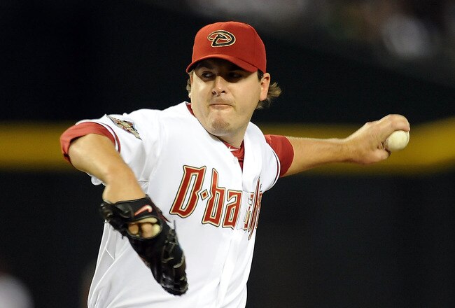 PHOENIX, AZ - AUGUST 11:  Starter Joe Saunders #34 of the Arizona Diamondbacks delivers a pitch in the first inning against the Houston Astros at Chase Field on August 11, 2011 in Phoenix, Arizona.  (Photo by Norm Hall/Getty Images)