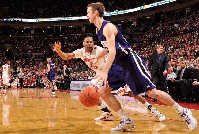 COLUMBUS, OH - DECEMBER 28:  J.D. Weatherspoon #15 of the Ohio State Buckeyes defends against John Shurna #24 of the Northwestern Wildcats on December 28, 2011 at Value City Arena in Columbus, Ohio. Ohio State defeated Northwestern 87-54.   (Photo by Jamie Sabau/Getty Images)