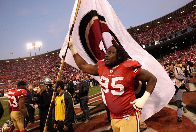 SAN FRANCISCO, CA - JANUARY 14: Ricky Jean Francois #95 of the San Francisco 49ers celebrates after they beat the New Orleans Saints in the NFC Divisional playoff game at Candlestick Park on January 14, 2012 in San Francisco, California.  (Photo by Ezra Shaw/Getty Images)