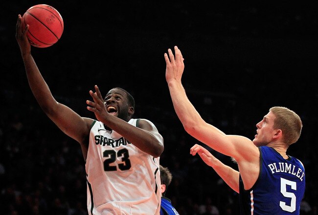 NEW YORK - NOVEMBER 15: Draymond Green #23 of the Michigan State Spartens drives to the basket against Mason Plumlee #5 of the Duke Blue Devils 5quare Garden on November 15, 2011 in New York City.  (Photo by Chris Trotman/Getty Images)