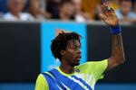 MELBOURNE, AUSTRALIA - JANUARY 21:  Gael Monfils of France acknowledges the crowd after losing his third round match against Mikhail Kukushkin of Kazakhstan during day six of the 2012 Australian Open at Melbourne Park on January 21, 2012 in Melbourne, Australia.  (Photo by Cameron Spencer/Getty Images)