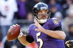 BALTIMORE, MD - JANUARY 15:  Quarterback Joe Flacco #5 of the Baltimore Ravens passes against the Houston Texans during the AFC Divisional playoff game at M&T Bank Stadium on January 15, 2012 in Baltimore, Maryland.  (Photo by Rob Carr/Getty Images)