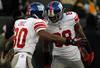 GREEN BAY, WI - JANUARY 15:   Victor Cruz #80 of the New York Giants celebrates with teammate Hakeem Nicks #88 after a play against the Green Bay Packers during their NFC Divisional playoff game at Lambeau Field on January 15, 2012 in Green Bay, Wisconsin.  (Photo by Jonathan Daniel/Getty Images)