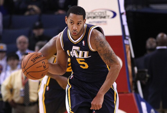 OAKLAND, CA - JANUARY 07:  Devin Harris #5 of the Utah Jazz in action against the Golden State Warriors at Oracle Arena on January 7, 2012 in Oakland, California.  NOTE TO USER: User expressly acknowledges and agrees that, by downloading and or using this photograph, User is consenting to the terms and conditions of the Getty Images License Agreement.  (Photo by Ezra Shaw/Getty Images)