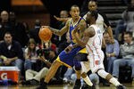 CHARLOTTE, NC - JANUARY 14:  Monta Ellis #8 of the Golden State Warriors posts up Kemba Walker #1 of the Charlotte Bobcats during their game at Time Warner Cable Arena on January 14, 2012 in Charlotte, North Carolina.  NOTE TO USER: User expressly acknowledges and agrees that, by downloading and or using this photograph, User is consenting to the terms and conditions of the Getty Images License Agreement.  (Photo by Streeter Lecka/Getty Images)