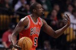 BOSTON, MA - JANUARY 13: Luol Deng #9 of the Chicago Bulls signals for his teammates to move in the first half against the Boston Celtics on January 13, 2012 at TD Garden in Boston, Massachusetts. NOTE TO USER: User expressly acknowledges and agrees that, by downloading and or using this photograph, User is consenting to the terms and conditions of the Getty Images License Agreement.  (Photo by Elsa/Getty Images)