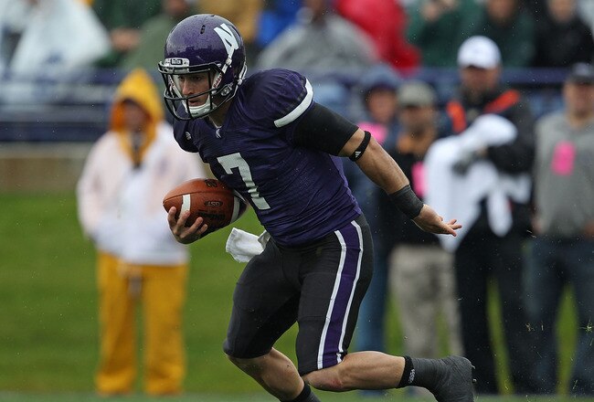EVANSTON, IL - OCTOBER 23: Dan Persa #7 of the Northwestern Wildcats runs against the Michigan State Spartans at Ryan Field on October 23, 2010 in Evanston, Illinois. Michigan State defeated Northwestern 35-27. (Photo by Jonathan Daniel/Getty Images)