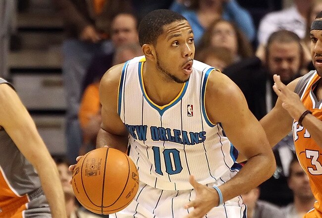 PHOENIX, AZ - DECEMBER 26:  Eric Gordon #10 of the New Orleans Hornets handles the ball during the season openning NBA game against the Phoenix Suns at US Airways Center on December 26, 2011 in Phoenix, Arizona.  The Hornets defeated the Suns 85-84. NOTE TO USER: User expressly acknowledges and agrees that, by downloading and or using this photograph, User is consenting to the terms and conditions of the Getty Images License Agreement.  (Photo by Christian Petersen/Getty Images)