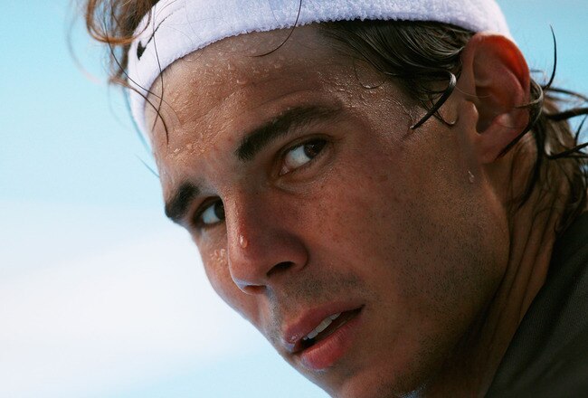 MELBOURNE, AUSTRALIA - JANUARY 21:  Rafael Nadal of Spain looks on during a practice session on day six of the 2012 Australian Open at Melbourne Park on January 21, 2012 in Melbourne, Australia.  (Photo by Ryan Pierse/Getty Images)