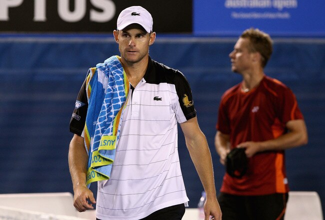 MELBOURNE, AUSTRALIA - JANUARY 19:  Andy Roddick (L) of the USA walks from the court after retiring in his second round match against Lleyton Hewitt of Australia during day four of the 2012 Australian Open at Melbourne Park on January 19, 2012 in Melbourne, Australia.  (Photo by Quinn Rooney/Getty Images)