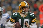 GREEN BAY, WI - JANUARY 01:  Matt Flynn #10 of the Green Bay Packerslooks for a receiver against the Detroit Lions at Lambeau Field on January 1, 2012 in Green Bay, Wisconsin. The Packers defeated the Lions 45-41.  (Photo by Jonathan Daniel/Getty Images)
