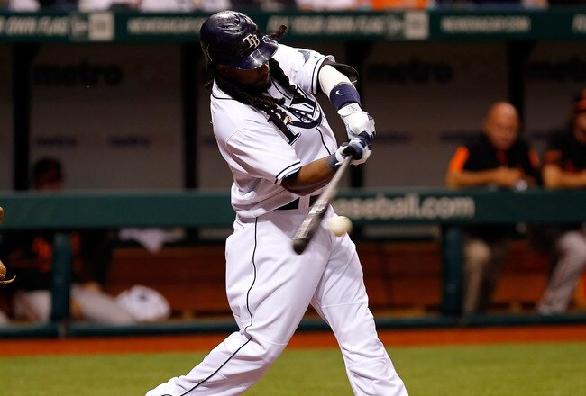 ST. PETERSBURG, FL - APRIL 01:  Designated hitter Manny Ramirez #24 of the Tampa Bay Rays fouls off a pitch against the Baltimore Orioles during the Opening Day game at Tropicana Field on April 1, 2011 in St. Petersburg, Florida.  (Photo by J. Meric/Getty Images)