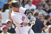 BOSTON, MA  - JUNE 19:  Marco Scutaro #10 of the Boston Red Sox hits a home run against of the Milwaukee Brewers at Fenway Park on June 19, 2011 in Boston, Massachusetts.  (Photo by Jim Rogash/Getty Images)