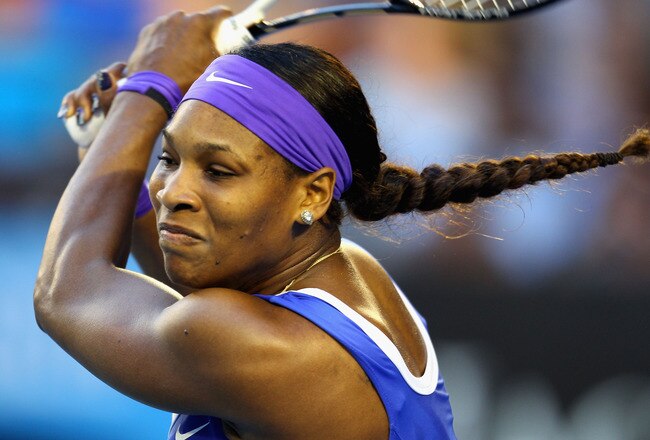 MELBOURNE, AUSTRALIA - JANUARY 21:  Serena Williams of the United States of America plays a backhand in her third round match against Greta Arn of Hungary during day six of the 2012 Australian Open at Melbourne Park on January 21, 2012 in Melbourne, Australia.  (Photo by Scott Barbour/Getty Images)