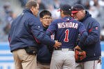 NEW YORK, NY - APRIL 07:  Tsuyoshi Nishioka #1 of the Minnesota Twins leaves the game injured after being hit by Nick Swisher #33 of the New York Yankees at Yankee Stadium on April 7, 2011 in the Bronx borough of New York City.  (Photo by Nick Laham/Getty Images)