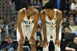 ANAHEIM, CA - JANUARY 05:  Tyler Lamb #1 and Jerime Anderson #5 of of the UCLA Bruins confer during the game with the Arizona Wildcats at the Honda Center on January 5, 2012 in Anaheim, California.  UCLA won 65-58.  (Photo by Stephen Dunn/Getty Images)