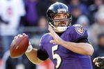 BALTIMORE, MD - JANUARY 15:  Quarterback Joe Flacco #5 of the Baltimore Ravens passes against the Houston Texans during the AFC Divisional playoff game at M&T Bank Stadium on January 15, 2012 in Baltimore, Maryland.  (Photo by Rob Carr/Getty Images)