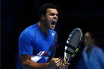 LONDON, ENGLAND - NOVEMBER 26:  Jo-Wilfried Tsonga of France celebrates winning the men's singles semi-final match against Tomas Berdych of Czech Republic during the Barclays ATP World Tour Finals at the O2 Arena on November 26, 2011 in London, England. Tsonga won 6-3 7-5 and will meet Roger Federer of Switzerland in the final.  (Photo by Clive Brunskill/Getty Images)