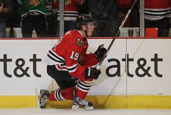 CHICAGO, IL - JANUARY 20: Jonathan Toews #19 of the Chicago Blackhawks celebrates a first period goal against the Florida Panthers at the United Center on January 20, 2012 in Chicago, Illinois. (Photo by Jonathan Daniel/Getty Images)