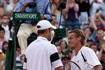 WIMBLEDON, ENGLAND - JULY 01:  Lleyton Hewitt of Australia (R) shakes hands with Andy Roddick of USA after the men's singles quarter final match Championships at the All England Lawn Tennis and Croquet Club on July 1, 2009 in London, England.  (Photo by Hamish Blair/Getty Images)