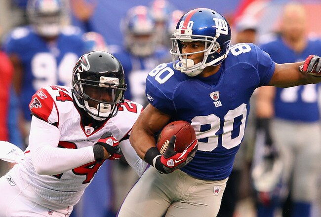 EAST RUTHERFORD, NJ - JANUARY 08:  Victor Cruz #80 of the New York Giants makes a first down reception in the second half against Dominique Franks #24 of the Atlanta Falcons during their NFC Wild Card Playoff game at MetLife Stadium on January 8, 2012 in East Rutherford, New Jersey.  (Photo by Al Bello/Getty Images)
