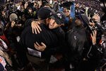 BALTIMORE, MD - NOVEMBER 24:  Head coach Jim Harbaugh of the San Francisco 49ers  (L) hugs his brother head coach John Harbaugh of the Baltimore Ravens (R) after the Ravens defeated the 49ers 16-6 at M&T Bank Stadium on November 24, 2011 in Baltimore, Maryland.  (Photo by Rob Carr/Getty Images)
