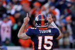 DENVER, CO - JANUARY 08:  Tim Tebow #15 of the Denver Broncos celebrates after running the ball in the end zone for a touchdown in the second quarter against the Pittsburgh Steelers during the AFC Wild Card Playoff game at Sports Authority Field at Mile High on January 8, 2012 in Denver, Colorado.  (Photo by Jeff Gross/Getty Images)