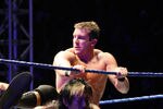 DURBAN, SOUTH AFRICA - JULY 08:  Ted DiBiase battles Yoshi Tatsu during the WWE Smackdown Live Tour at Westridge Park Tennis Stadium on July 08, 2011 in Durban, South Africa.  (Photo by Steve Haag/Gallo Images/Getty Images)