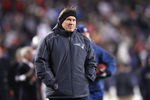 FOXBORO, MA - JANUARY 14:  Head coach Bill Belichick of the New England Patriots looks on during warm ups against the Denver Broncos during their AFC Divisional Playoff Game at Gillette Stadium on January 14, 2012 in Foxboro, Massachusetts.  (Photo by Elsa/Getty Images)