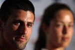 PERTH, AUSTRALIA - JANUARY 06:  Novak Djokovic and Ana Ivanovic of Serbia talk to the media before their mixed doubles match against Justine Henin and Ruben Bemelmans of Belgium on day six of the Hopman Cup at The Burswood Dome on January 6, 2011 in Perth, Australia.  (Photo by Paul Kane/Getty Images)