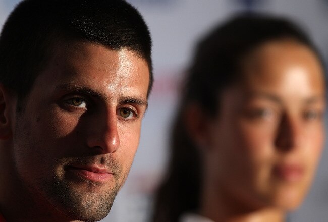 PERTH, AUSTRALIA - JANUARY 06:  Novak Djokovic and Ana Ivanovic of Serbia talk to the media before their mixed doubles match against Justine Henin and Ruben Bemelmans of Belgium on day six of the Hopman Cup at The Burswood Dome on January 6, 2011 in Perth, Australia.  (Photo by Paul Kane/Getty Images)