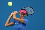 MELBOURNE, AUSTRALIA - JANUARY 12:  Ana Ivanovic of Serbia plays a backhand during practice ahead of the 2012 Australian Open at Rod Laver Arena on January 12, 2012 in Melbourne, Australia.  (Photo by Scott Barbour/Getty Images)
