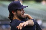 MILWAUKEE, WI - OCTOBER 10:  Ryan Braun #8 of the Milwaukee Brewers stretches during batting practice against the St. Louis Cardinals during Game Two of the National League Championship Series at Miller Park on October 10, 2011 in Milwaukee, Wisconsin.  (Photo by Jonathan Daniel/Getty Images)
