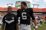 MIAMI GARDENS, FL - DECEMBER 04:  Terrelle Pryor #6 of the Oakland Raiders walks off the field after a game against the Miami Dolphins at Sun Life Stadium on December 4, 2011 in Miami Gardens, Florida.  (Photo by Mike Ehrmann/Getty Images)