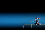 MELBOURNE, AUSTRALIA - JANUARY 22:  Feliciano Lopez of Spain plays a backhand in his fourth round match against Rafael Nadal of Spain during day seven of the 2012 Australian Open at Melbourne Park on January 22, 2012 in Melbourne, Australia.  (Photo by Cameron Spencer/Getty Images)