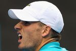 MELBOURNE, AUSTRALIA - JANUARY 20:  John Isner of the United States reacts in his third round match against Feliciano Lopez of Spain during day five of the 2012 Australian Open at Melbourne Park on January 20, 2012 in Melbourne, Australia.  (Photo by Lucas Dawson/Getty Images)
